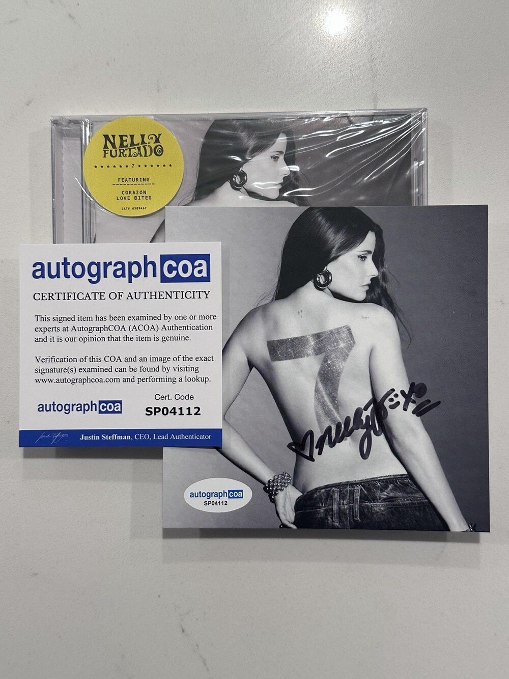 Nelly Furtado Signed - 7 CD + Signed Art Card (Love Bites) AUTOGRAPHED COA #4